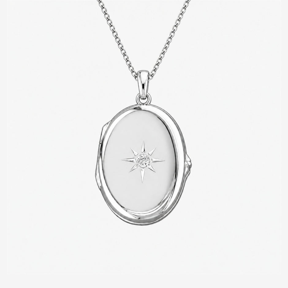 Clear Starburst Sterling Silver Oval Locket