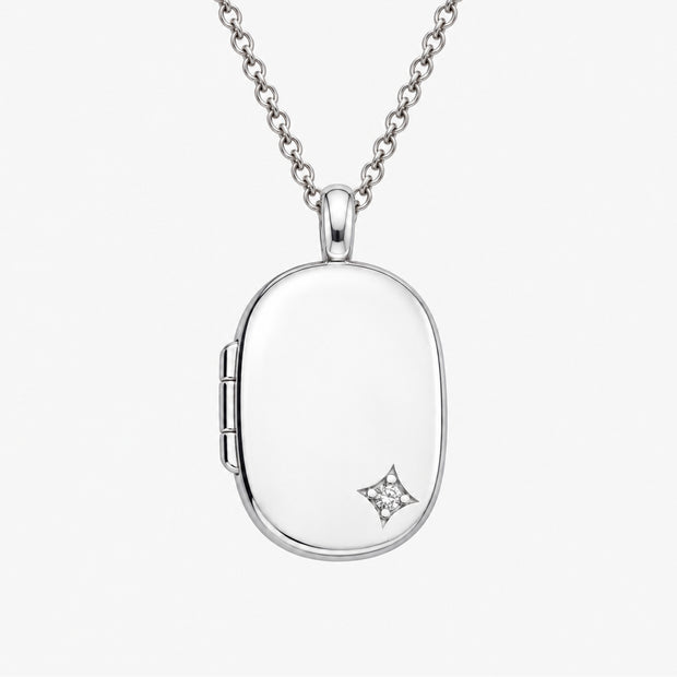 Corner Star Accent Sterling Silver Oval Locket